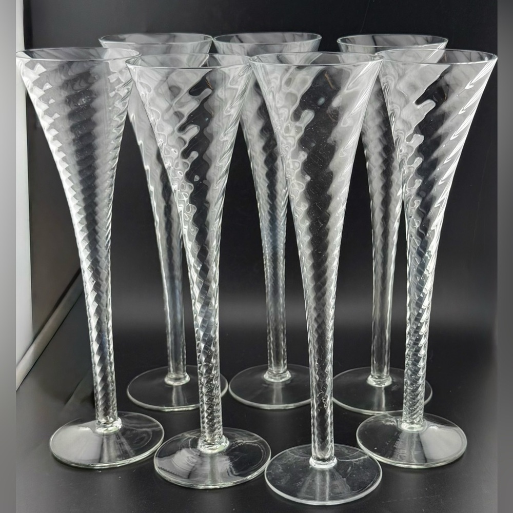 7 Crate & Barrel “Renoir” hollow stemmed champagne flutes. 6oz 10”H